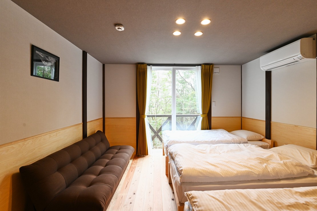 石川県 輪島・能登のコテージ｜家族コテージ ノトイエ ６号棟セジュールの写真：清潔なベッドルームです。